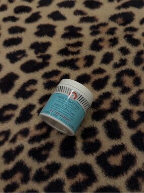 First Aid Beauty Facial Radiance Pads in light blue and white jar